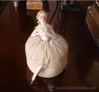 muñeca porcelana acerico